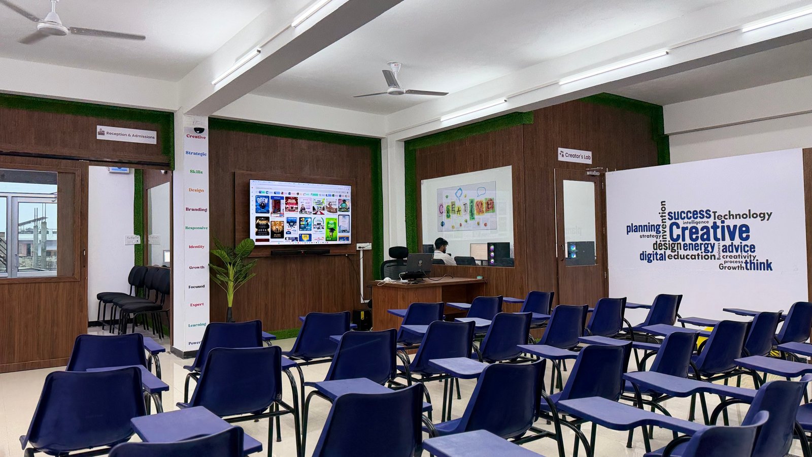 Students editing videos in classroom
